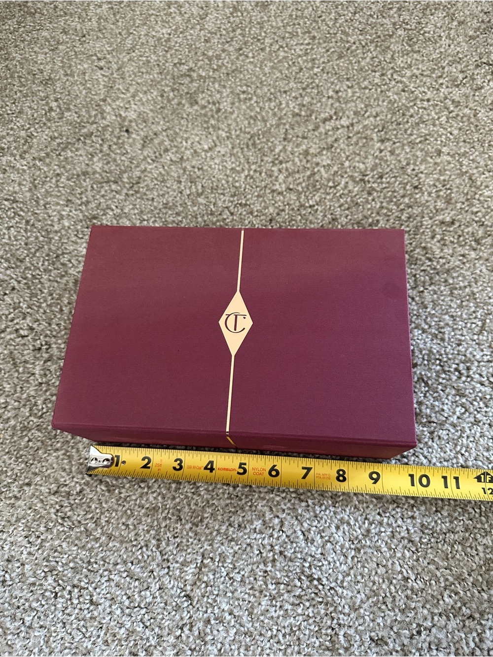 Charlotte Tilbury Burgundy Box with Gold Accent